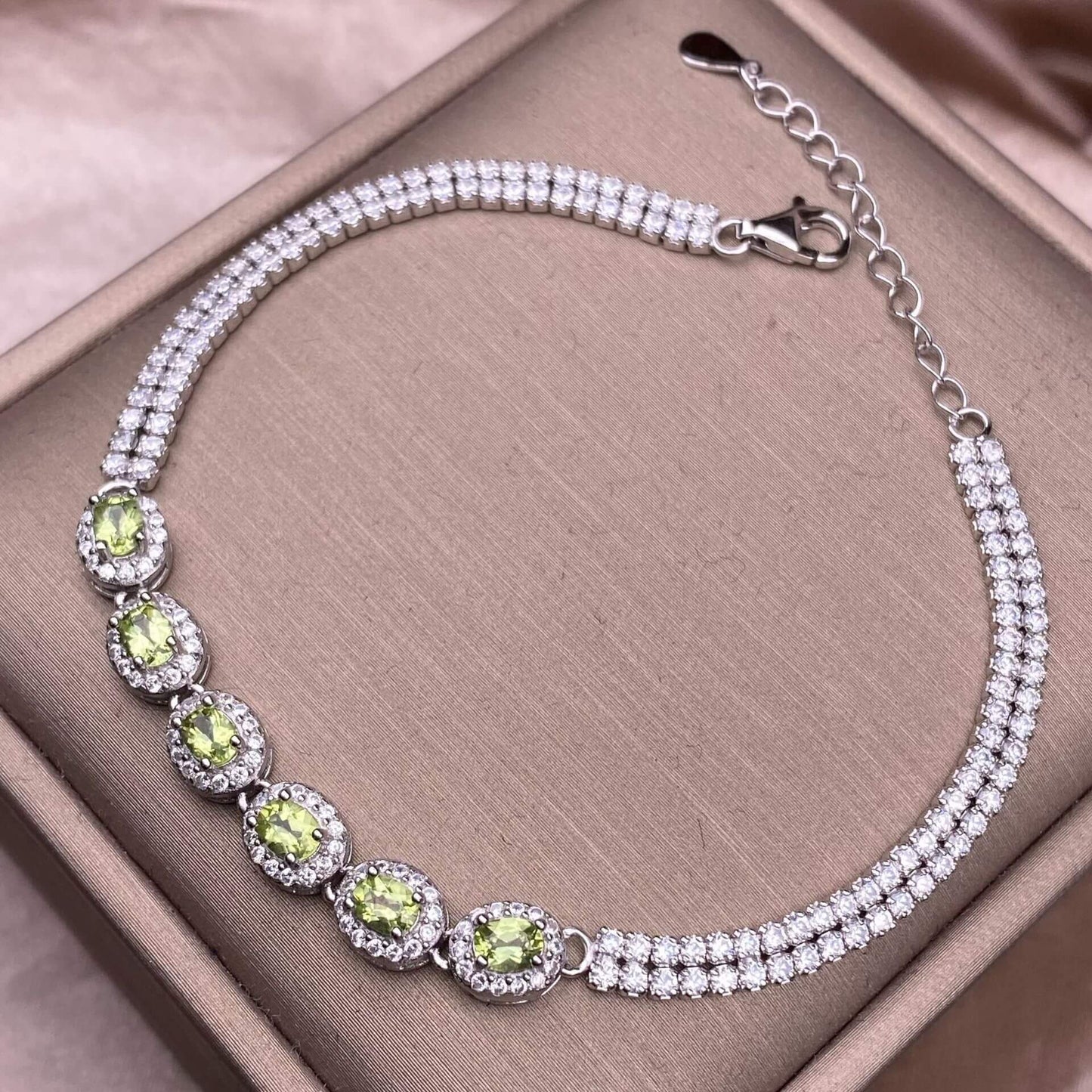 Black Opal Diopside, olivine Bracelet The S925 silver bracelet, inlaid with numerous diamonds, is an exquisite and light luxury Australian jewelry piece. It is dazzling and free of impurities, a fashionable OL silver accessory