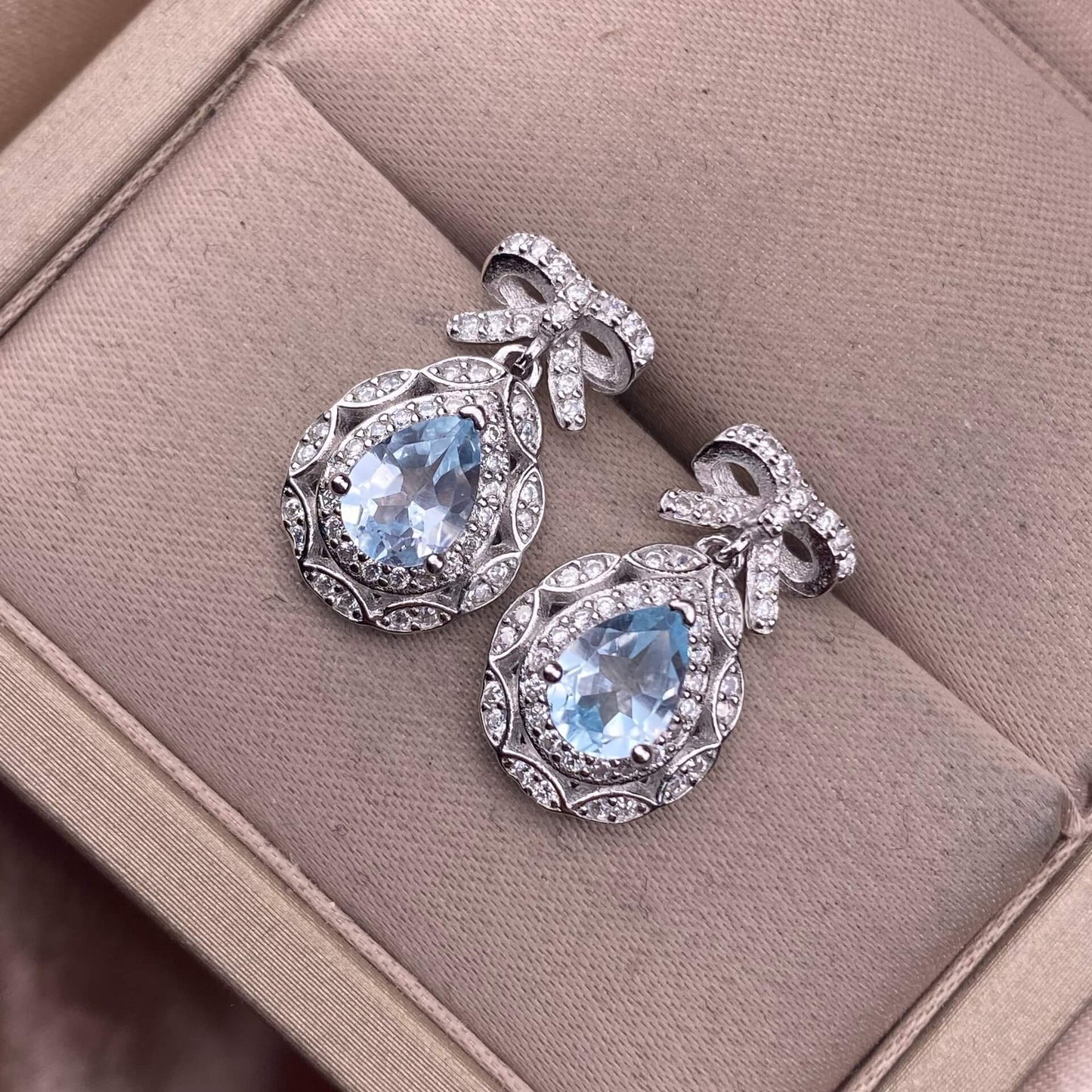 Opal Peridot, citrine, topaz, garnet, amethyst S925 earrings, silver inlaid with Opal, dazzling and uncluttered, fashionable office ladies' niche earrings with a water drop bow