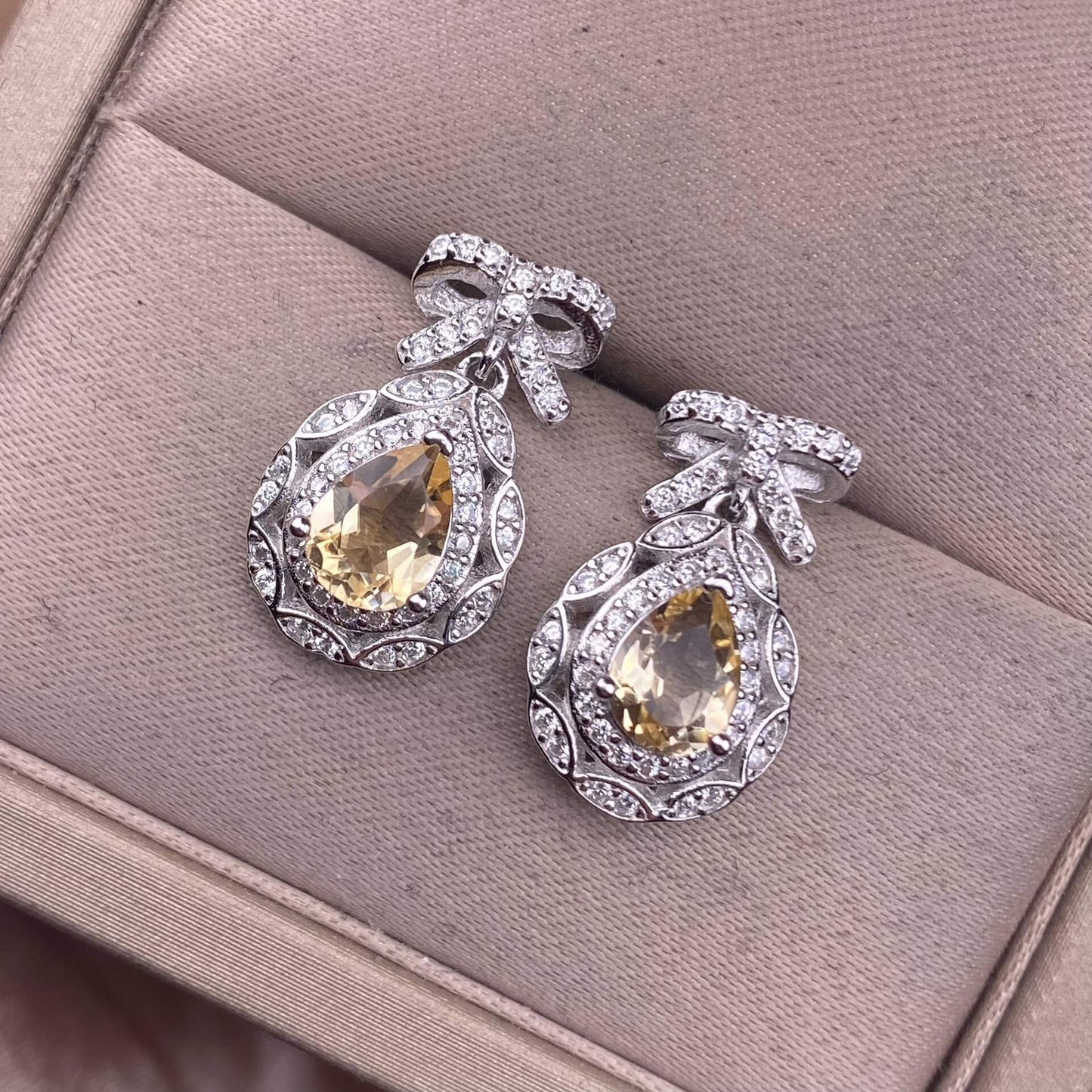 Opal Peridot, citrine, topaz, garnet, amethyst S925 earrings, silver inlaid with Opal, dazzling and uncluttered, fashionable office ladies' niche earrings with a water drop bow