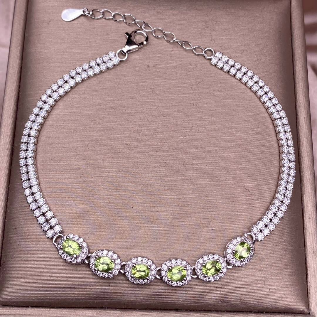 Black Opal Diopside, olivine Bracelet The S925 silver bracelet, inlaid with numerous diamonds, is an exquisite and light luxury Australian jewelry piece. It is dazzling and free of impurities, a fashionable OL silver accessory