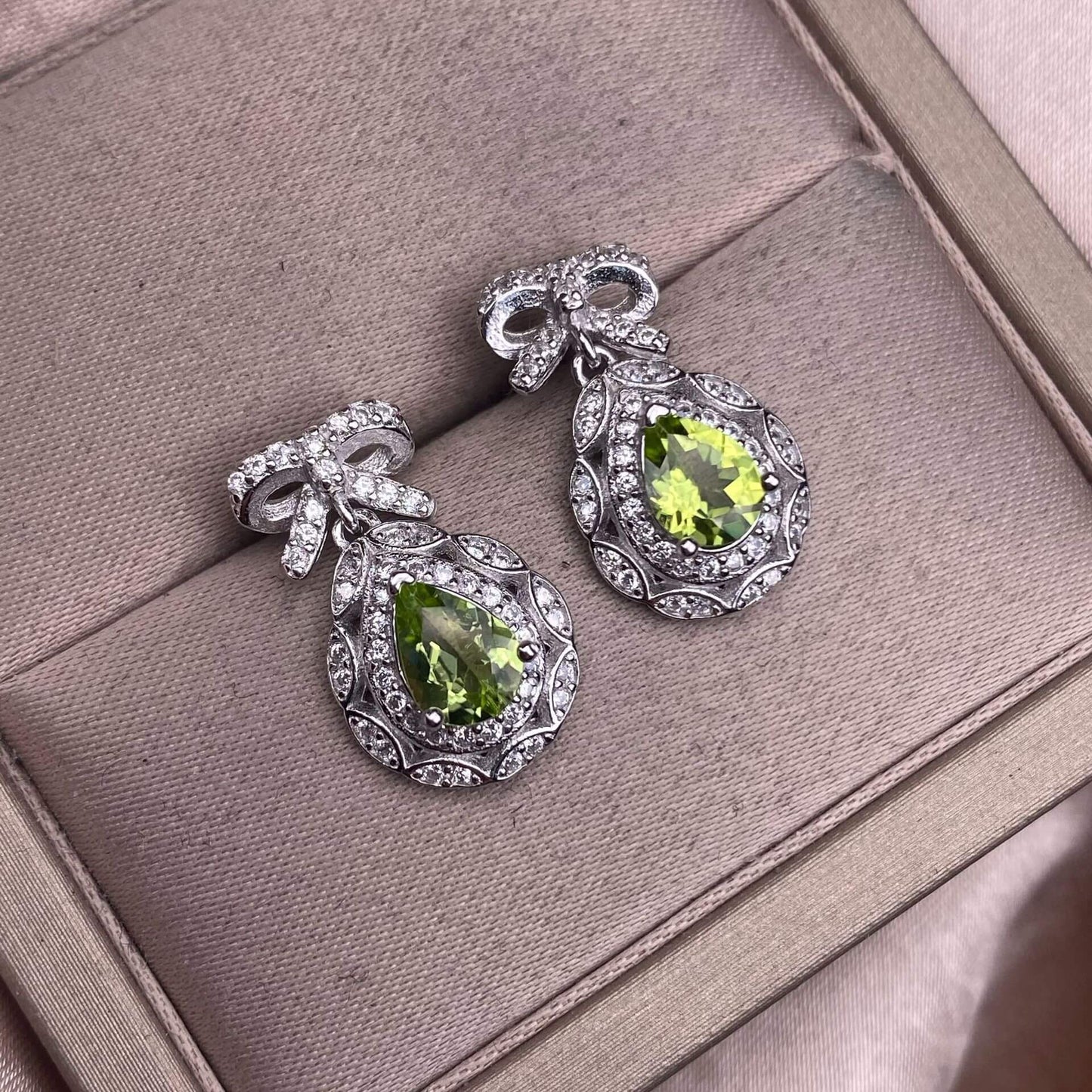 Opal Peridot, citrine, topaz, garnet, amethyst S925 earrings, silver inlaid with Opal, dazzling and uncluttered, fashionable office ladies' niche earrings with a water drop bow