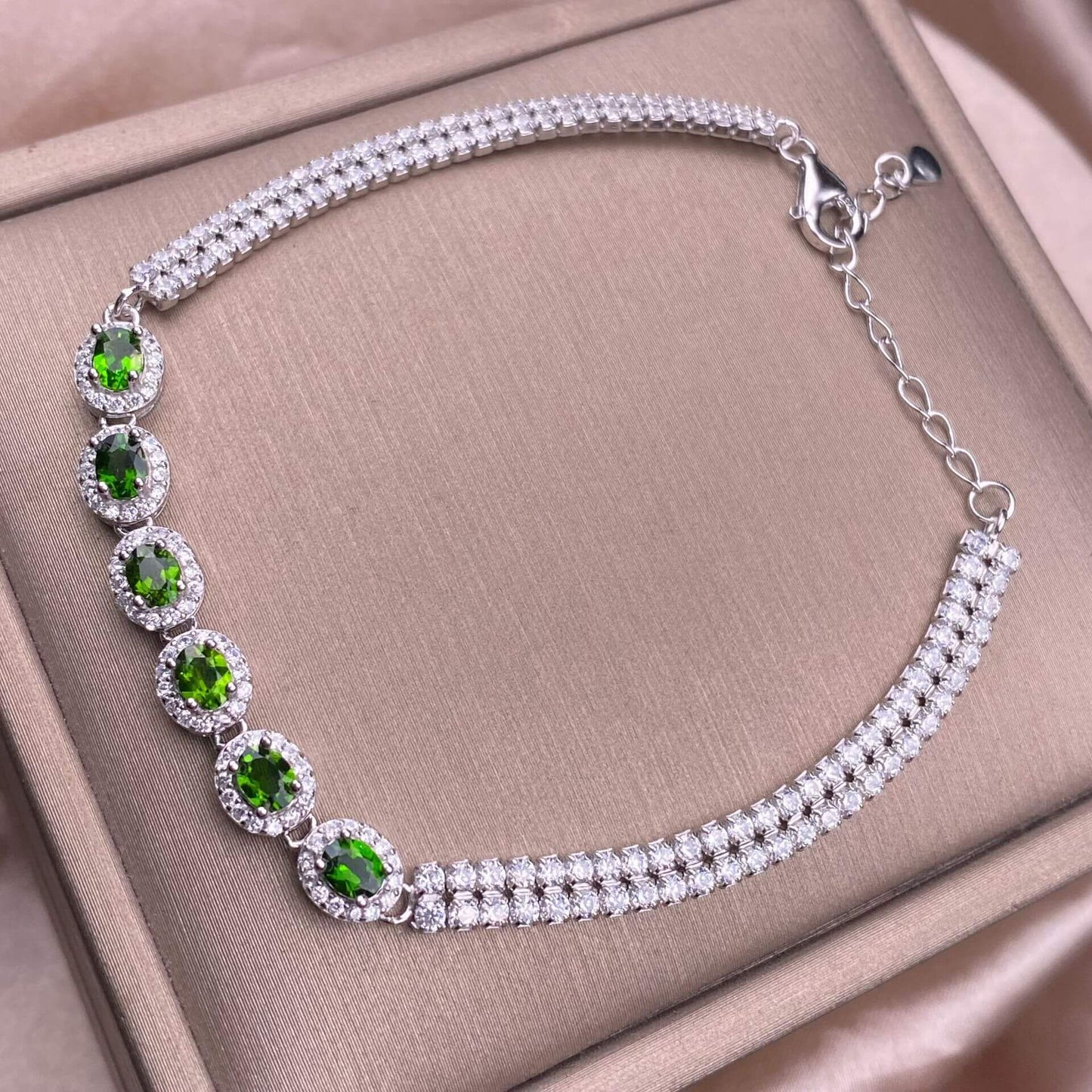 Black Opal Diopside, olivine Bracelet The S925 silver bracelet, inlaid with numerous diamonds, is an exquisite and light luxury Australian jewelry piece. It is dazzling and free of impurities, a fashionable OL silver accessory