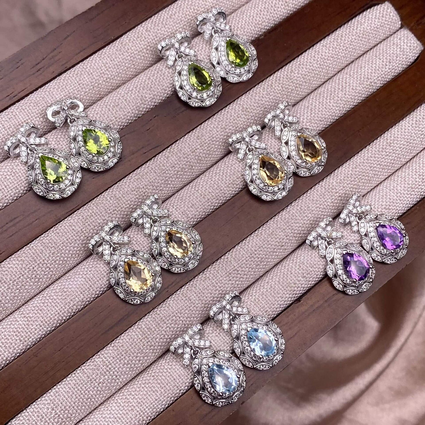 Opal Peridot, citrine, topaz, garnet, amethyst S925 earrings, silver inlaid with Opal, dazzling and uncluttered, fashionable office ladies' niche earrings with a water drop bow