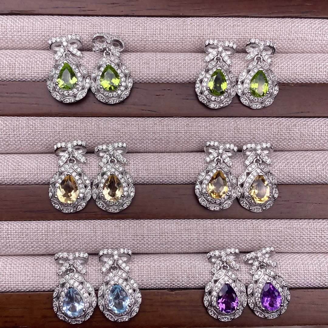 Opal Peridot, citrine, topaz, garnet, amethyst S925 earrings, silver inlaid with Opal, dazzling and uncluttered, fashionable office ladies' niche earrings with a water drop bow