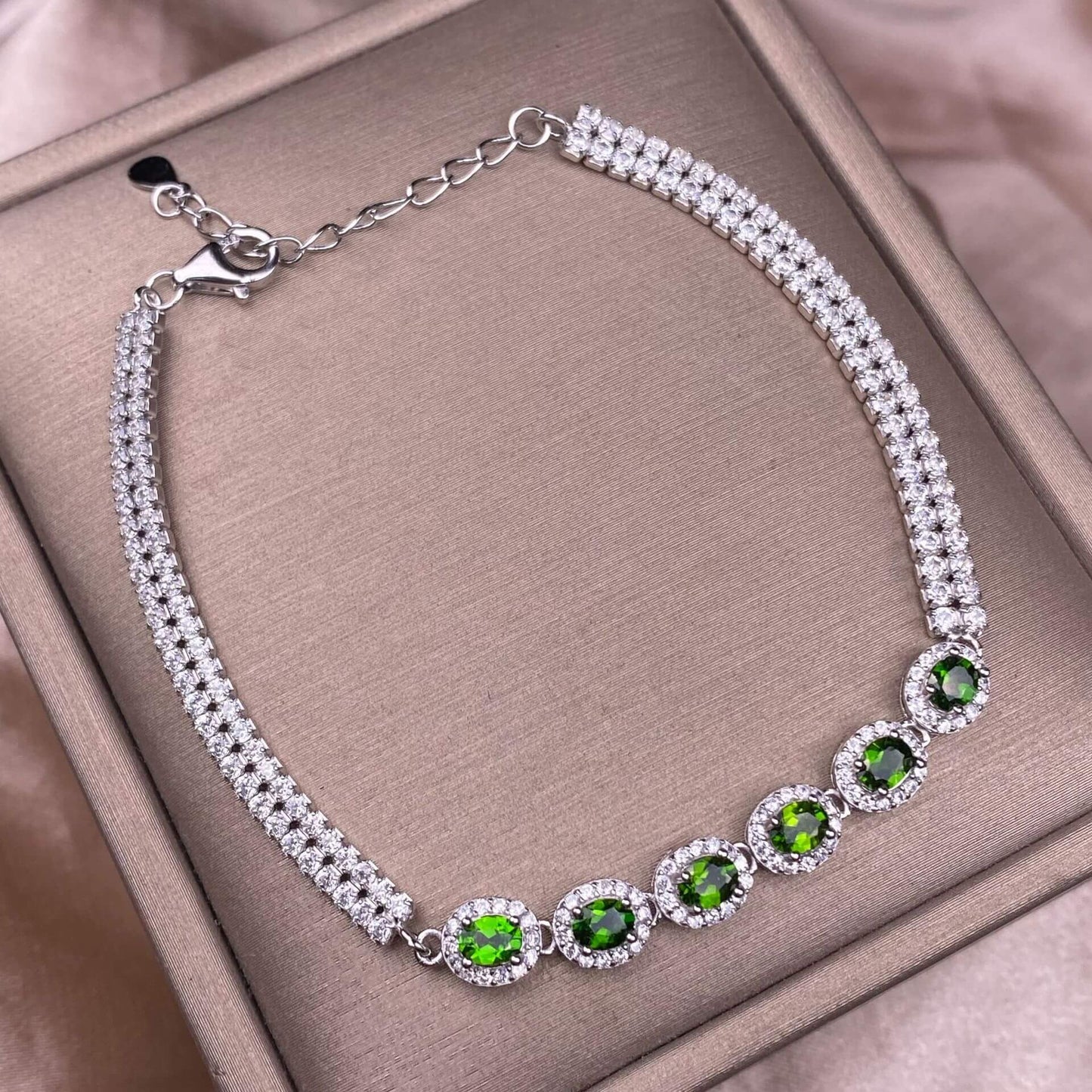 Black Opal Diopside, olivine Bracelet The S925 silver bracelet, inlaid with numerous diamonds, is an exquisite and light luxury Australian jewelry piece. It is dazzling and free of impurities, a fashionable OL silver accessory