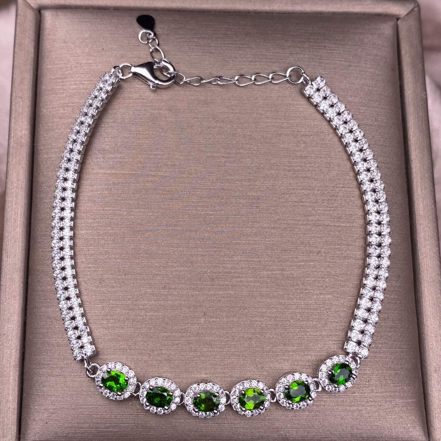Black Opal Diopside, olivine Bracelet The S925 silver bracelet, inlaid with numerous diamonds, is an exquisite and light luxury Australian jewelry piece. It is dazzling and free of impurities, a fashionable OL silver accessory