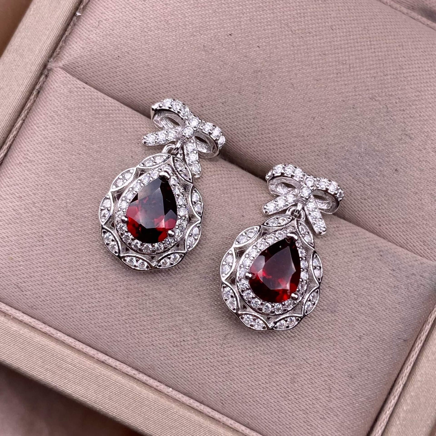 Opal Peridot, citrine, topaz, garnet, amethyst S925 earrings, silver inlaid with Opal, dazzling and uncluttered, fashionable office ladies' niche earrings with a water drop bow