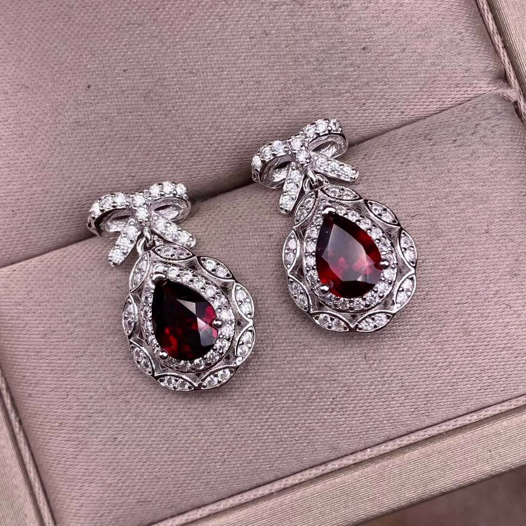 Opal Peridot, citrine, topaz, garnet, amethyst S925 earrings, silver inlaid with Opal, dazzling and uncluttered, fashionable office ladies' niche earrings with a water drop bow