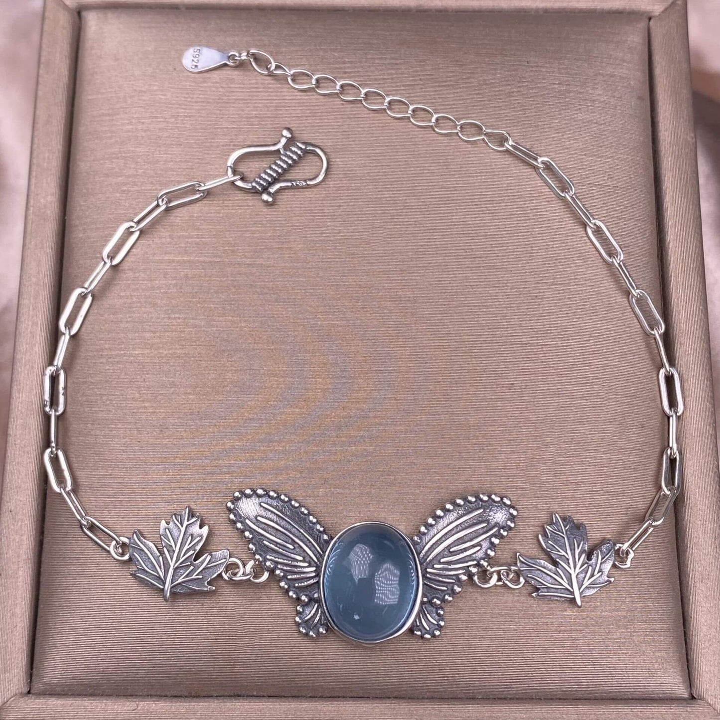 Silver necklace with butterfly and leaf design sea blue Aquamarine