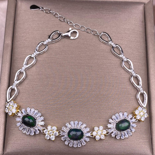Silver bracelet with green gemstones and floral designsBlack Opal/ Opal Bracelet The s925 silver inlaid vintage silver distressed Nepalese feather-shaped shell jewelry has a strong lustrous effect 