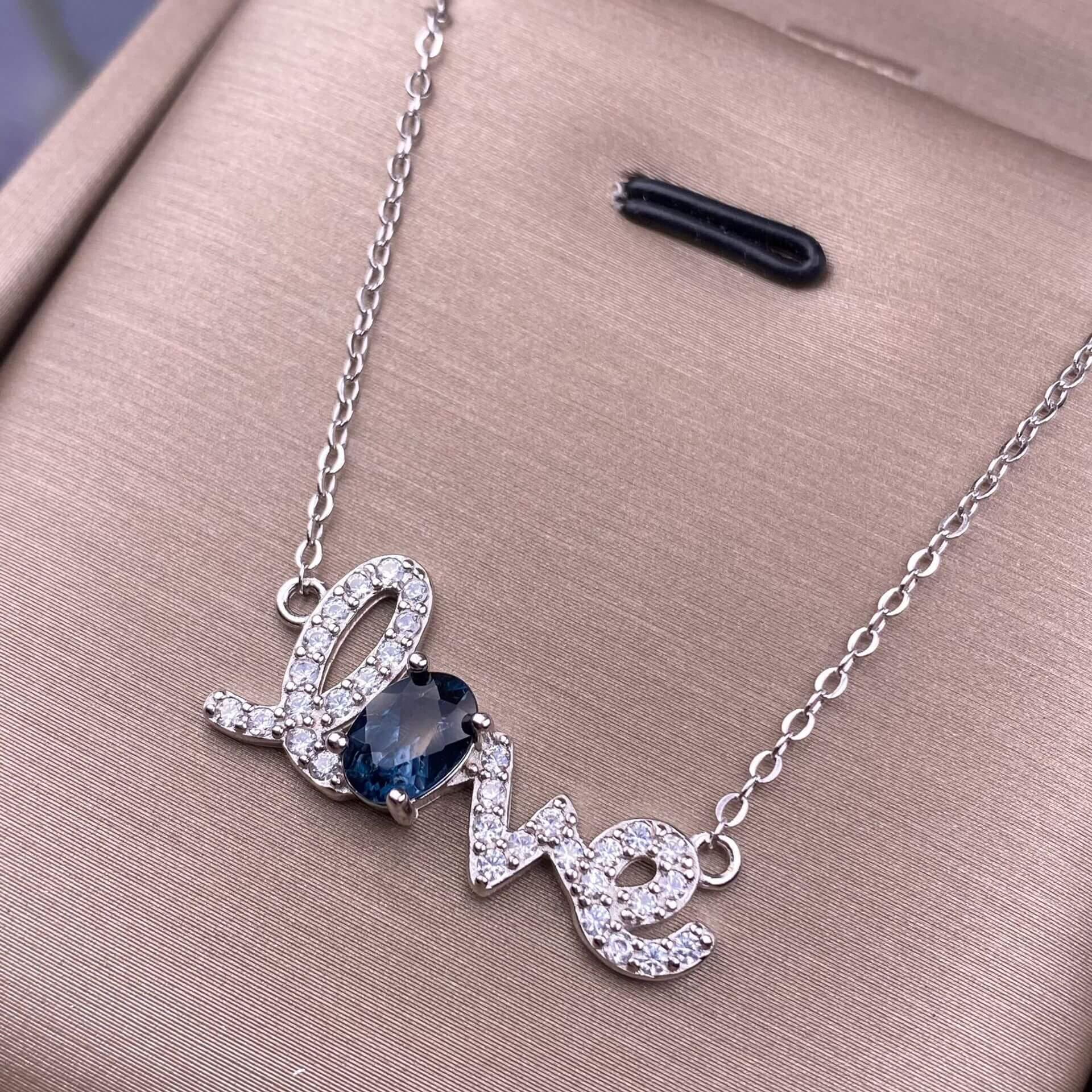 Silver necklace with 'love' pendant featuring a blue gemstone Blue topa, golden stone, turquoise S925 necklace, silver inlaid with full diamonds, exquisite light luxury evening wear chain fashionable office lady