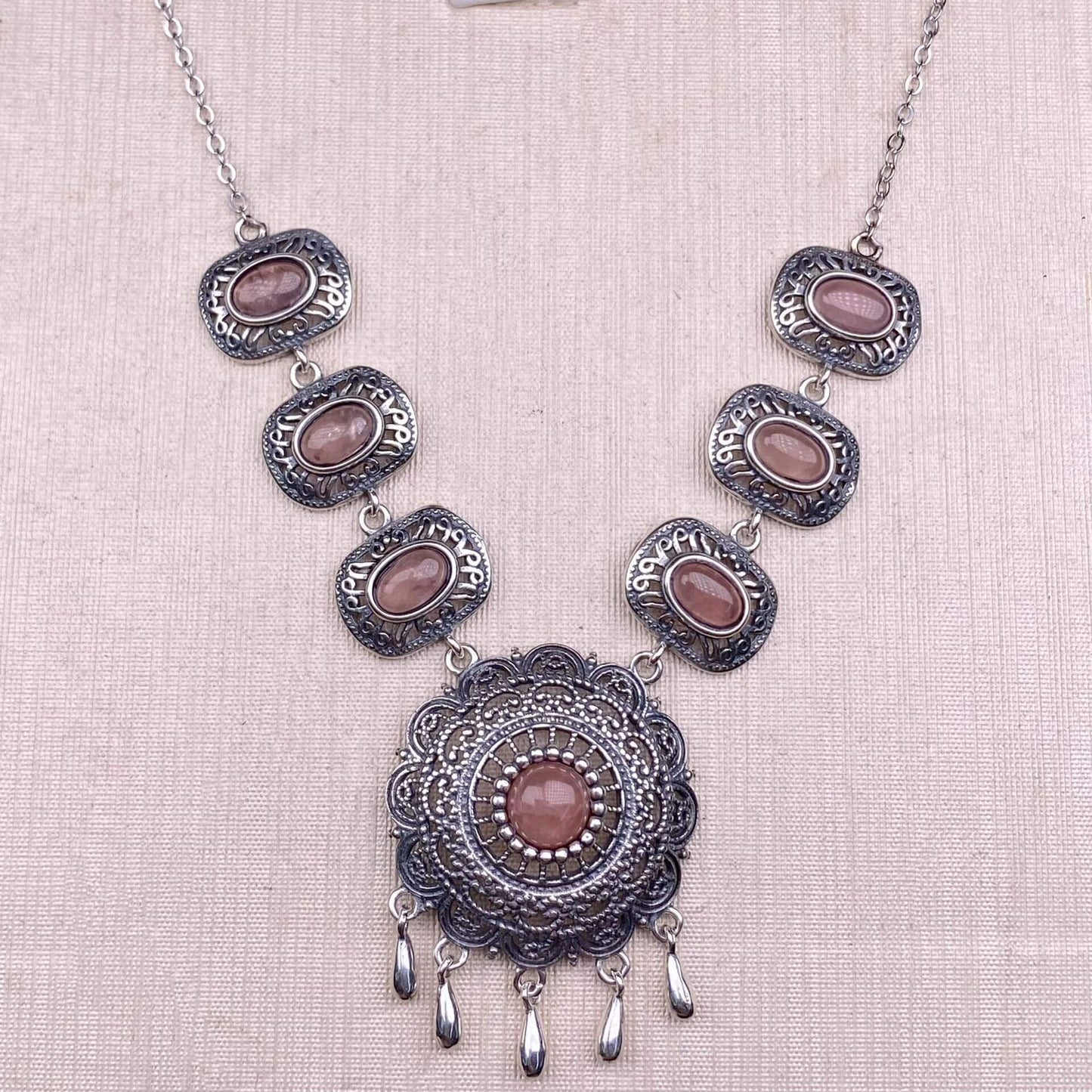 Ornate necklace with circular designs and brown stonesCitrine, black opal, black shell, garnet, purple dragon crystal, moonstone, purple tooth black, red jasper, jasper, golden fortune stone, copper hair crystal, gray moonlight, amethyst, peridot S925 necklace, silver inlaid with full diamonds,s925 collarbone chain, silver-encrusted little rabbit children pendant, garnet quality, pure water flawless 