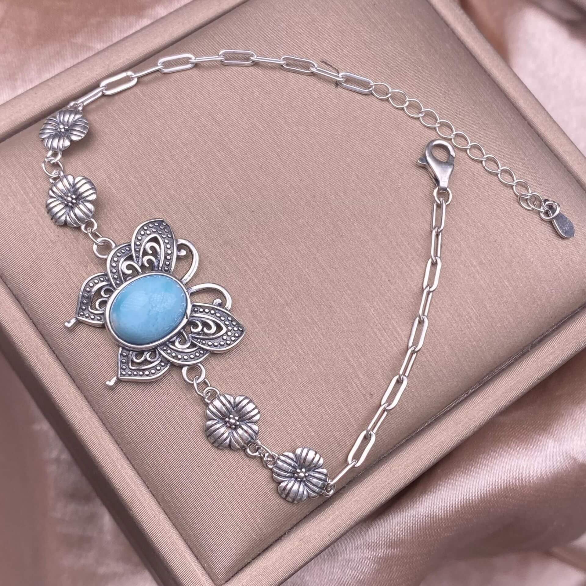 Silver bracelet with a blue stone Turquoise, abalone shells, grey moonstone, copper hair crystal, rose quartz, grape stone, purple lithium oxide, opal, old wax, Larima