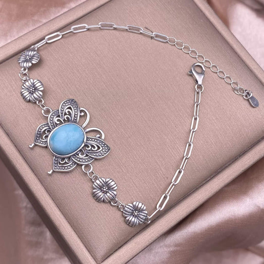 Silver bracelet with a blue stone Turquoise, abalone shells, grey moonstone, copper hair crystal, rose quartz, grape stone, purple lithium oxide, opal, old wax, Larima